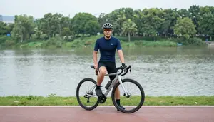 Cyclist With A Helmet Resting By A Bike Path River View