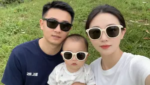 Dad Mom And Baby Wearing Matching Sunglasses Posing For A Summer Selfie