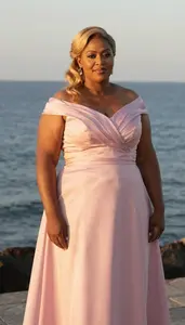 Ethiopian Mature Woman With Heavy With Blonde Half Up Half Down Wearing Soft