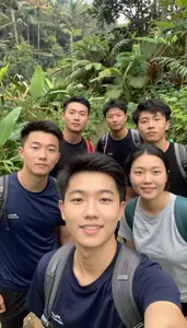 Group Of Friends Taking A Group Selfie On A Tropical Hiking Adventure