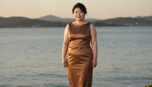 Japanese Woman In Her Early 20s With Heavyset Figure With Black Textured Hair