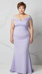 Korean Mature Woman With Plus Size Figure With Light Brown Short Pixie Cut