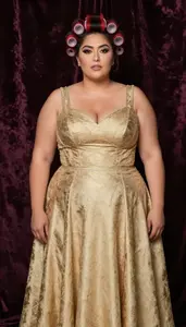 Latina Mature Woman With Generous Figure With Red Victory Rolls Wearing Gold