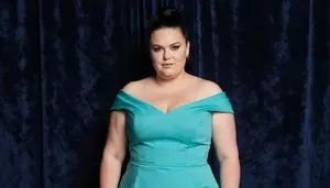 Scandinavian Woman In Her Early 30s With Extra Fat With Jet Black High Ponytail