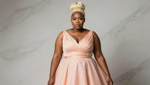 African Woman In Her Late 20s With Heavy With Platinum Blonde Bun Updo Wearing