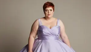 British Woman In Her Late 20s With Full Figured Figure With Auburn Short Pixie