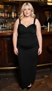 British Woman In Her Late 20s With Chubby Figure With Platinum Blonde Finger