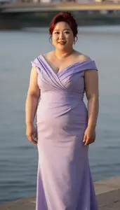 Korean Woman In Her Mid 30s With Full Figured Figure With Red Chignon Wearing
