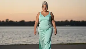 Latina Woman In Her Late 30s With Large Build Figure With Platinum Blonde Messy