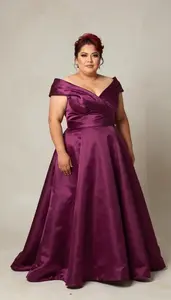 Mexican Woman In Her 40s With Robust Figure With Red Elegant Updo Wearing Plum