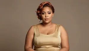 Mixed Race Woman In Her Early 30s With Curvy Figure With Copper Elegant Updo