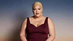 Multiracial Woman In Her Late 30s With Voluptuous Figure With Platinum Blonde