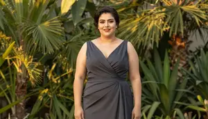 Persian Woman In Her Late 20s With Thick Figure With Dark Brown Chignon Wearing