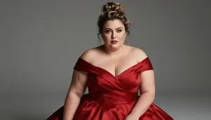 Turkish Woman In Her Late 30s With Plump Figure With Dark Blonde Messy Bun